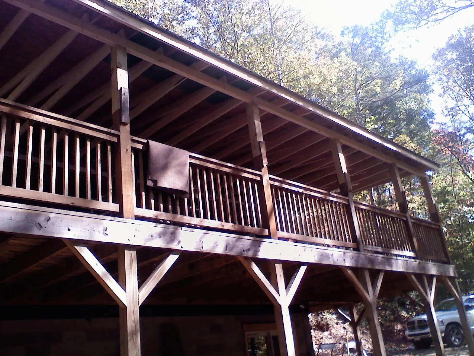 Timber framing under a new elevated porch and deck — Roof Leak Repair in Ainsworth by Roofing Brothers
